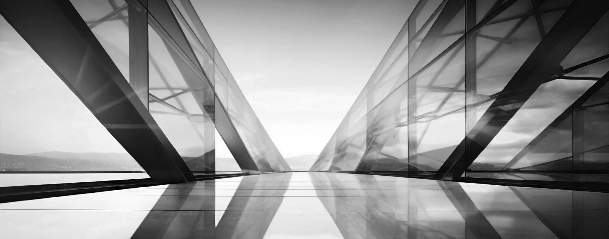 Black and white glass walkway with geometric shapes